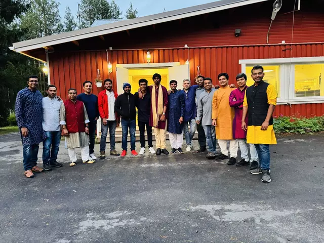 Community members participating in Janmashtami aarti ceremony