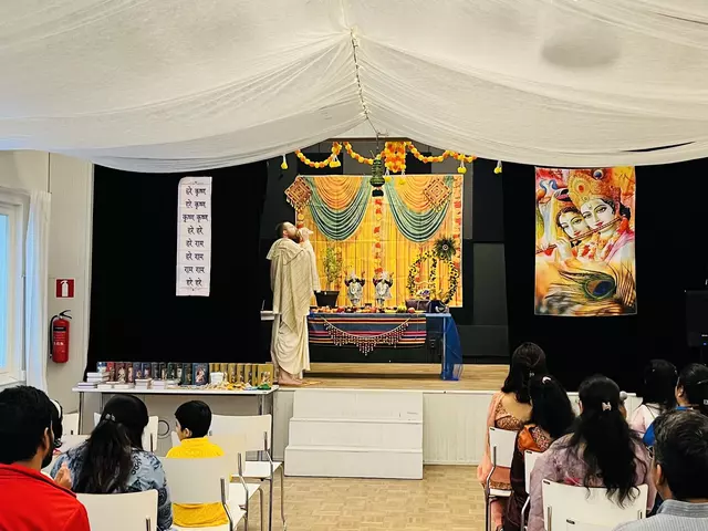 Community sharing prasad and tea during Janmashtami