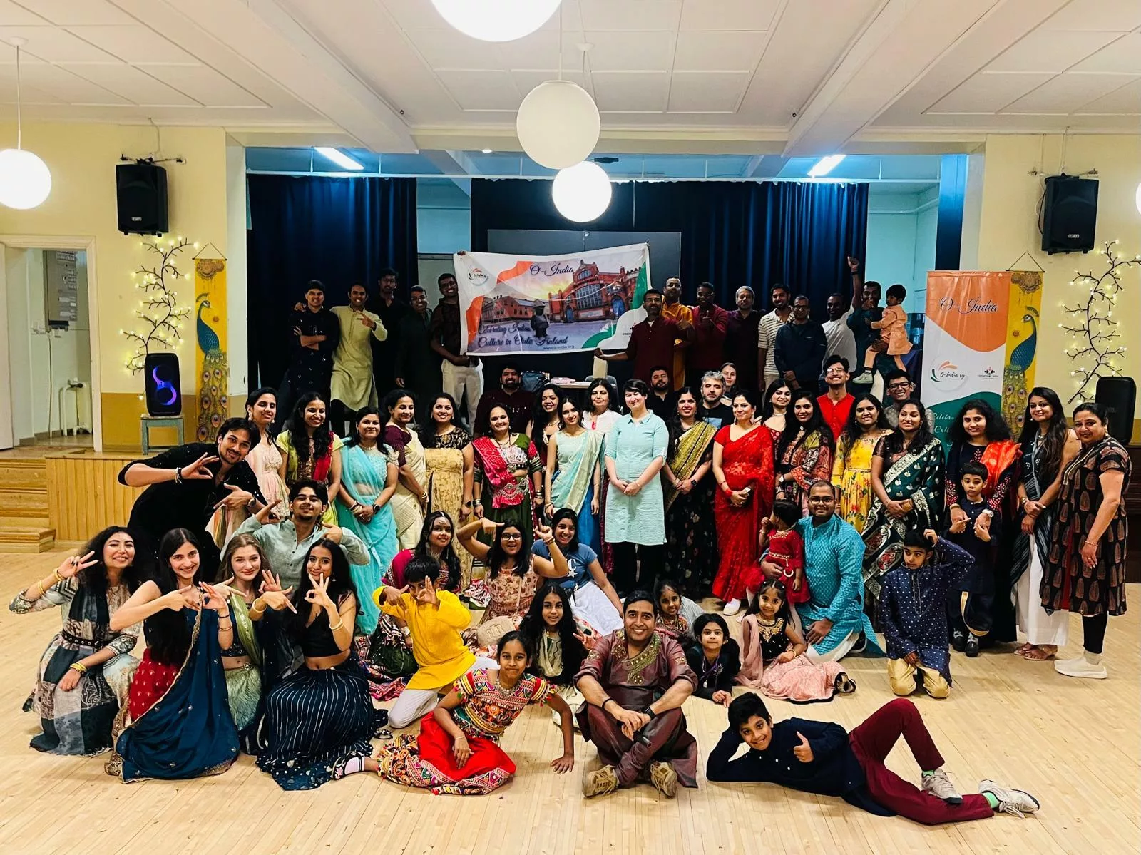 Community members dancing Dandiya in colorful traditional attire
